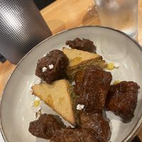 Popcorn chicken: delicious seitan with corn bread, corn pudding and popcorn! So unique! My favorite of the night .  at Bellwether in Jacksonville