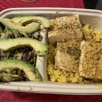 Great vegan  box with cauliflower rice, tofu, avocado and salad   at Kale in Hong Kong Island