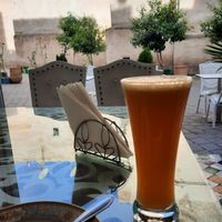 Orange juice (25 dirhams) and a view on the yard. at Dar Tajine in Fes