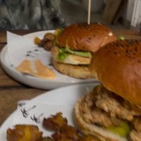 Sorry poor photo - mushroom burger front (highly recommend), flower power back (still really good but note the patty is mushy/ not crispy)   at Shady Lane in Mirissa