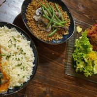 The three main dishes:
maffé (peanut stew)
lasagna 
grain "risotto" at Toutes Les Couleurs in Lyon