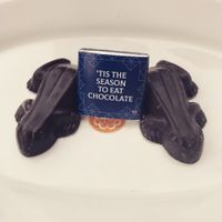 Dark choc frogs & little square of dark choc to have with my coffee, all Vegan  at San Churro in Joondalup