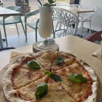 Vegan Margherita Pizza and Pina Colada   at Soma Bistro in La Pineda