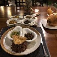  Main of red rice with multiple curries  at Koththamalli by Rohan in Negombo