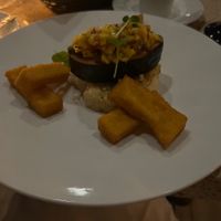 Grilled fish and roasted cauliflower with polenta fries  at Ike's Bistro in Oranjestad