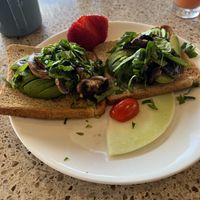 Avocado toast with mushrooms   at Ike's Bistro in Oranjestad