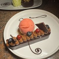 “Snickers” - unreal! with raspberry sorbet  at Ike's Bistro in Oranjestad