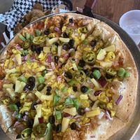 Loaded pizza with vegan cheese  at Chattanooga Pizza Co in Chattanooga