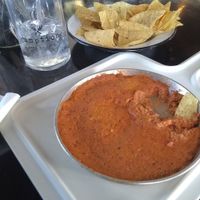"Not Yo' cheese dip" and tortilla chips (vegan) at gumption in Cedar Rapids