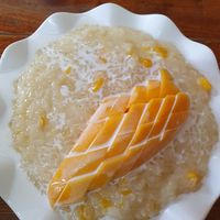 Mango sticky rice for 30.000 lak at Mama Lao in Nong Khiaw
