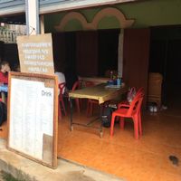 Three tables and chairs at Mama Lao in Nong Khiaw