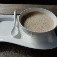 Coffee with coconut milk at Full Moon Wellness Cafe in Chiang Rai