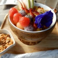Halloween special pumpkin smoothie granola bowl at Full Moon Wellness Cafe in Chiang Rai