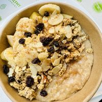 Porridge with banana and applee  at Healthy Harmony Piraeus in Piraeus