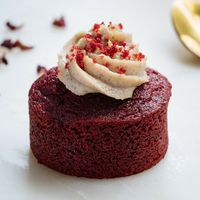 Vegan Red Velvet with Cinnamon Cashew Cream - 
A mature take on the Red Velvet, delicate, organic vanilla bean infused cake topped with cashew cream with a hint of maple cinnamon. at Mahadeva's Kitchen in Pointcook