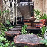 To one of the tables  at Fruto Mistico in Tulum