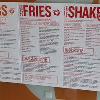 Wall menu at Next Level Burger - Brooklyn in Brooklyn