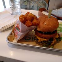 Maverick burger and tater tots at Next Level Burger - Brooklyn in Brooklyn