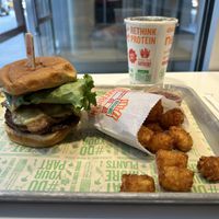 American Chzburger with double patty and tater tots  at Next Level Burger - Brooklyn in Brooklyn