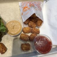 Tots with ketchup and chipotle mayo  at Next Level Burger - Brooklyn in Brooklyn