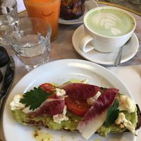 Vegan avo toast (expensive and disappointing) and oat matcha latte at Saint Pearl in Paris