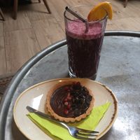 Vegan favourite tart and a aloha paradise smoothie!  at Barista Cafe in Haarlem