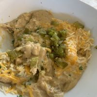 Biscuits and gravy with green chiles and cheese (vegan cheese is an option too)  at Copeka Coffee in Grand Junction