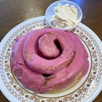 Hibiscus cinnamon roll with vegan butterr  at Copeka Coffee in Grand Junction