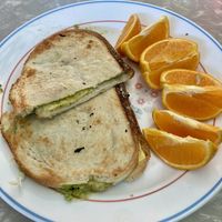 Breakfast panini with side of fruit 🍊   at Copeka Coffee in Grand Junction