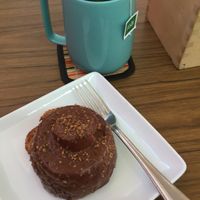 Hazelnut cinnamon roll and hot tea at Copeka Coffee in Grand Junction
