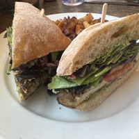Pesto sandwich w/ tofu ; can choose a market side and I got potatoes   at Hugo's Restaurant - Studio City in Studio City