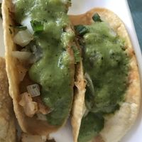 Crispy potato tacos with hot green salsa at Hugo's Restaurant - Studio City in Studio City