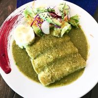Vegan mushroom enchiladas with green sauce, mashed potato and salad.  at El Zarape Malecón  in La Paz