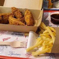Vegan wings, fries, bbq sauce at Temple of Seitan - Camden in North West London