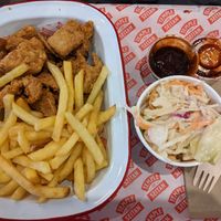Popcorn snack pack, coleslaw with BBQ sauce at Temple of Seitan - Camden in North West London