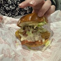 Inside of the Temple Burger - chicken, bacon, lettuce, pickles and sauce  at Temple of Seitan - Camden in North West London