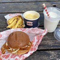 Burger, fries, cheese sauce, vanilla shake  at Temple of Seitan - Camden in North West London