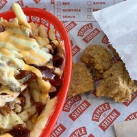 Loaded fries and OG chicken pieces  at Temple of Seitan - Camden in North West London
