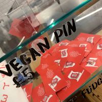 Woke badges at Temple of Seitan - Camden in North West London