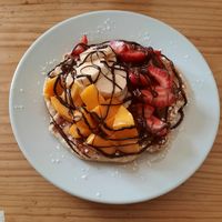 Vegan waffle with fruits and vegan chocolate at Gud  in Arequipa