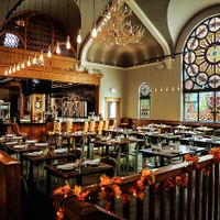 Beautiful stained glass interior.  118 year old former church!  at Salt Springs Brewery in Saline