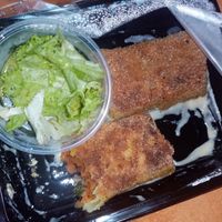 Krokiety with carrot fish, spinach and cheese souce at Fresh Kitchen in Lublin