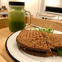 Green juice and cashew cheese toast at Eight - The Health Lounge in Lisbon