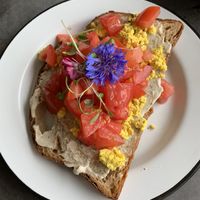 Showfu toast: dill cashew cheese, scrambled tofu, cherry tomato, sprouts  at Eight - The Health Lounge in Lisbon