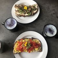 Toast with tofu scramble and dill cashew cheese, toast with mushroom and tofu ricotta, vanilla sky lattes at Eight - The Health Lounge in Lisbon