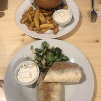 Burger w fries and seitan wrap  at Střecha in Prague