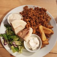 Seitan kebab with pita, fries and dips at Střecha in Prague
