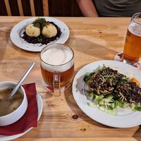 Dumpling on cabbage and potatoes with beans at Střecha in Prague