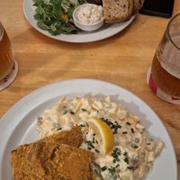 Ribs with salad and schnitzel with potato salad at Střecha in Prague