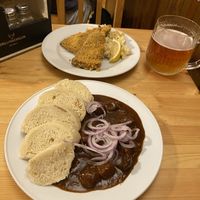 Gulash and schnitzel with potato salad  at Střecha in Prague